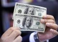 دلار جعلی در قلب بازار ارز؛ ۲ فروشنده دستگیر شدند